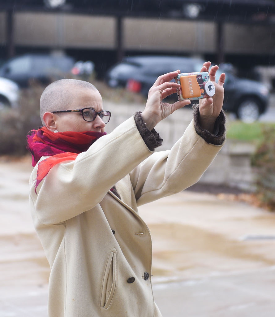 Valerie Berta takes a photo